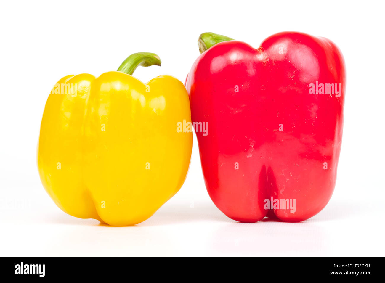 Red and yellow pepper are isolated on a white background Stock Photo ...