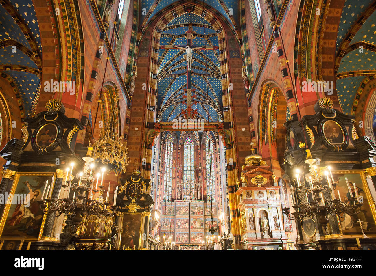 Mariacki Church - St. Mary's Basilica interior in Krakow, Poland, high altar, main nave Stock Photo