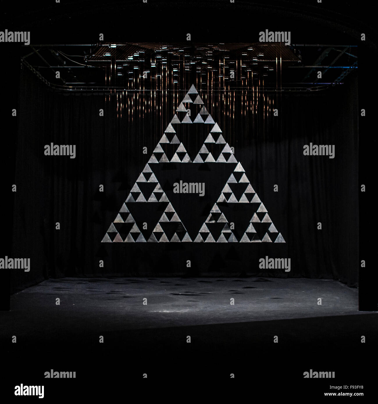 The Fractal Clock, created by artist and performer Richard Downing, at Castle Theatre Aberystwyth , consisting of 180 triangles of slate, each rotating at a different rate, all coming together to form the complete pattern, viewable from a fixed point in the auditorium,  once every hour. Stock Photo