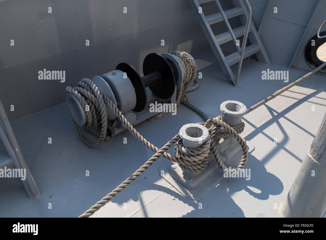 Close up detailed top view of grey nautical rope at an open deck of a ...