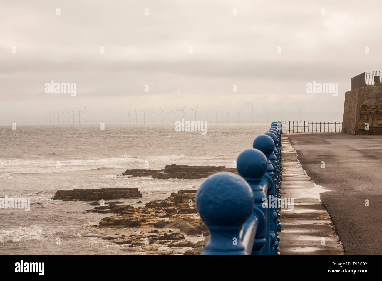 View of Hartlepool Headland showing the offshore wind turbines,stormy