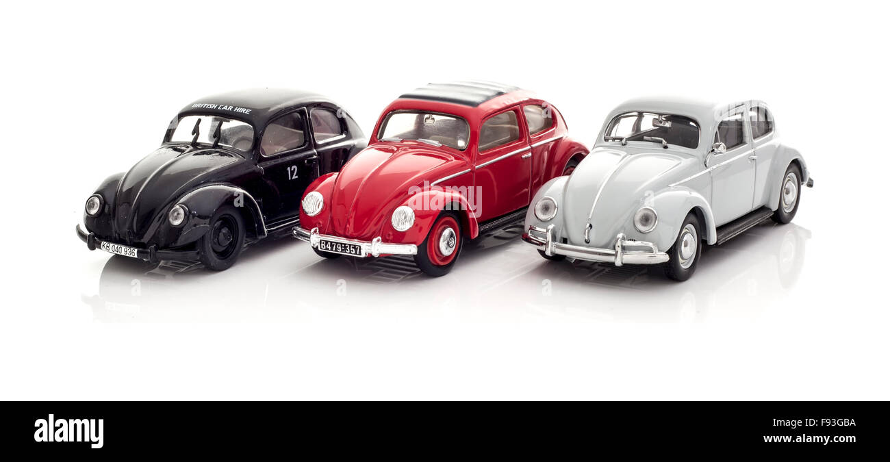 Three Vintage VW Beetles Die cast models on a white background. Stock Photo