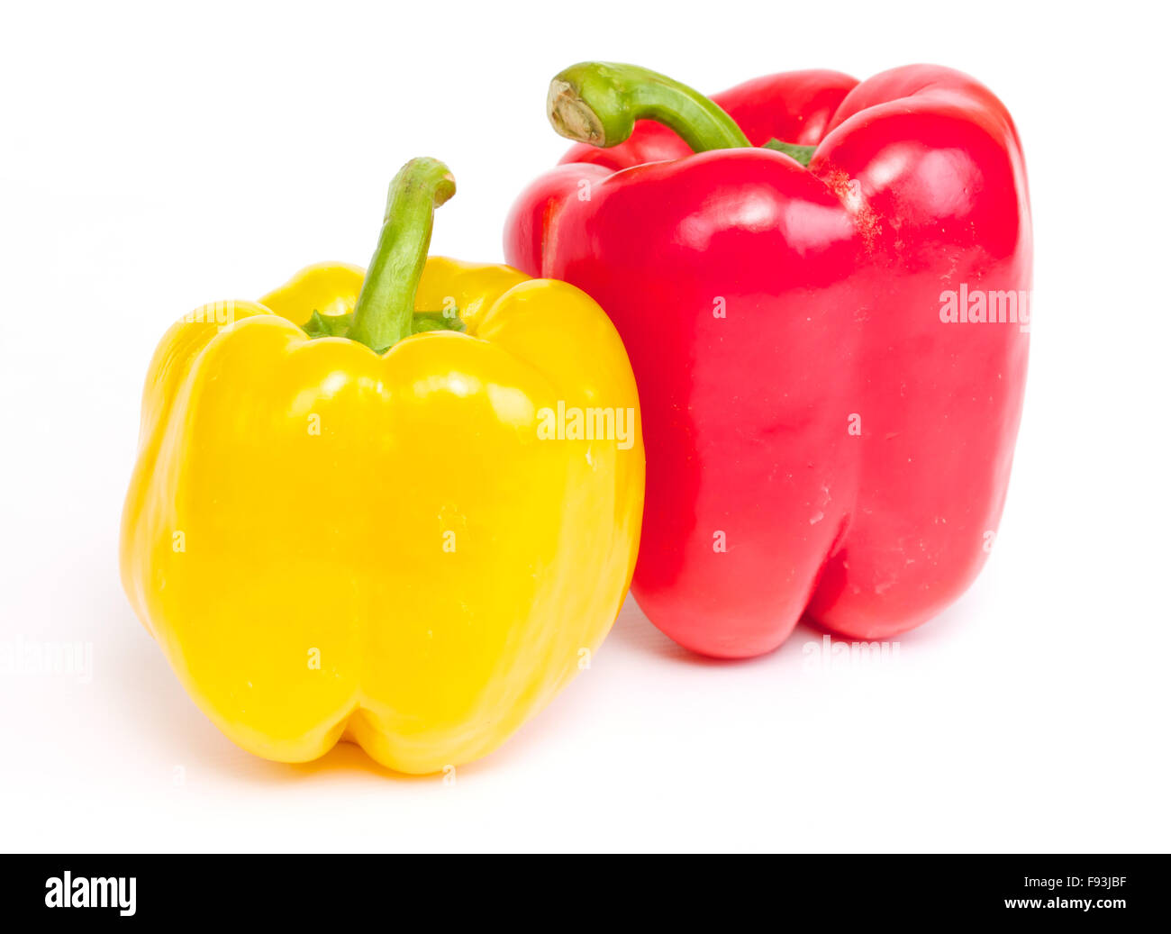 Red and yellow pepper are isolated on a white background Stock Photo ...