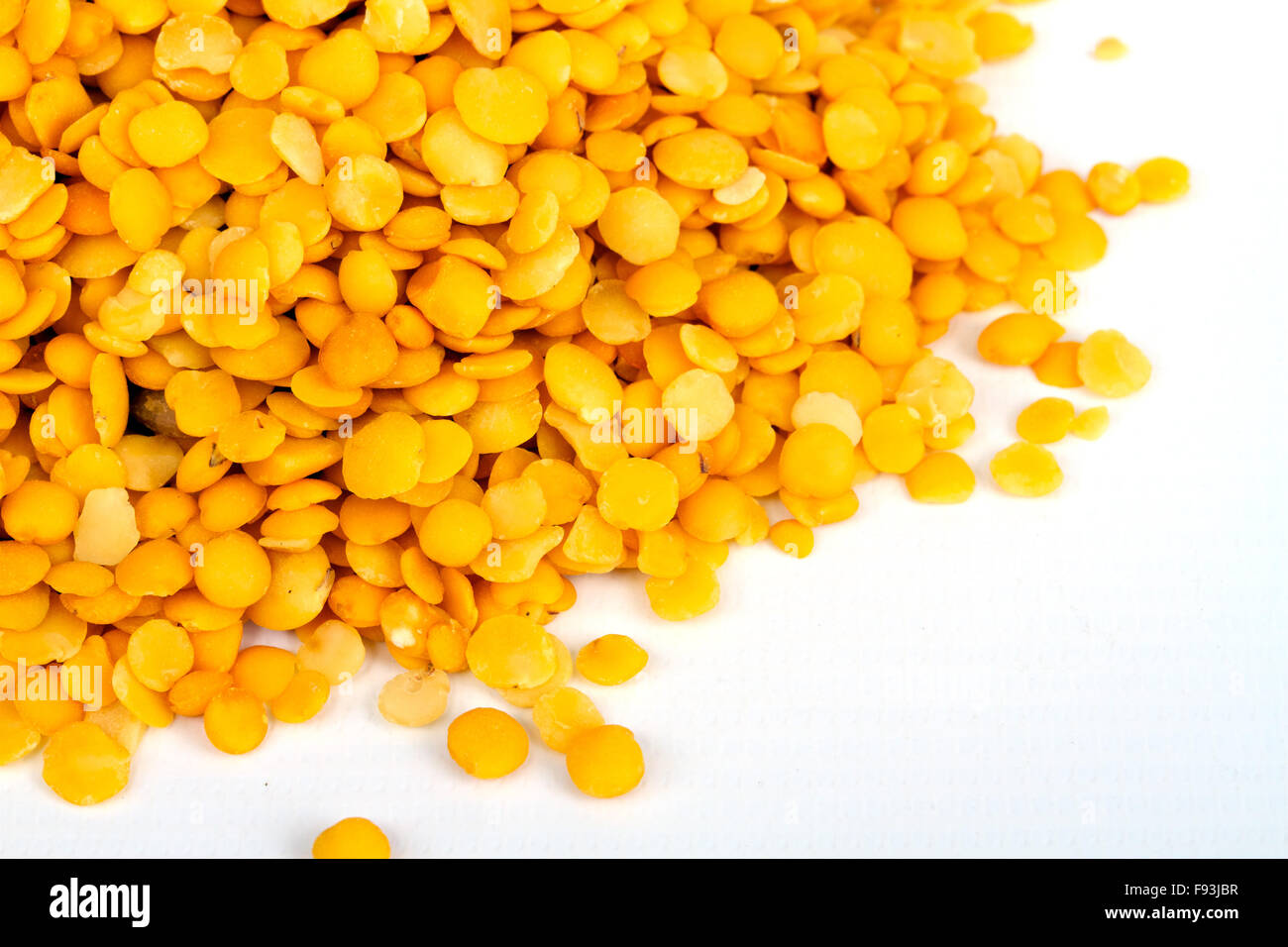 Yellow lentils isolated on white background.Macro shot Stock Photo Alamy