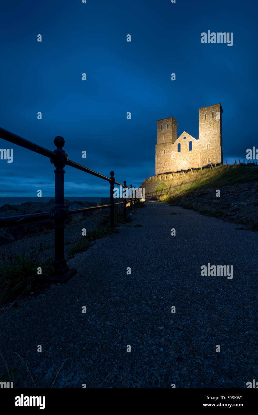 A twilight view of the twin towers of St. Mary's Church at Reculver on the North Kent coast. Stock Photo