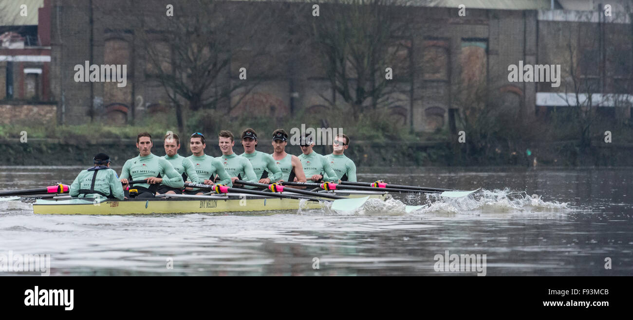 River Thames, UK. 13th December, 2015. Boat Race Trial VIIIs.  Cambridge  University Boat Club. Trial VIIIs serve as an important learning experience and selection test for the sixteen rowers and two coxes chosen. It is the only occasion during the season that the squad members race side-by-side for the entire four and a quarter miles of the Championship Course in a simulation of The BNY Mellon Boat Race. The two Cambridge crews taking to the water have been named ‘”Fuerte” and “Listo”. Credit:  Duncan Grove/Alamy Live News Stock Photo