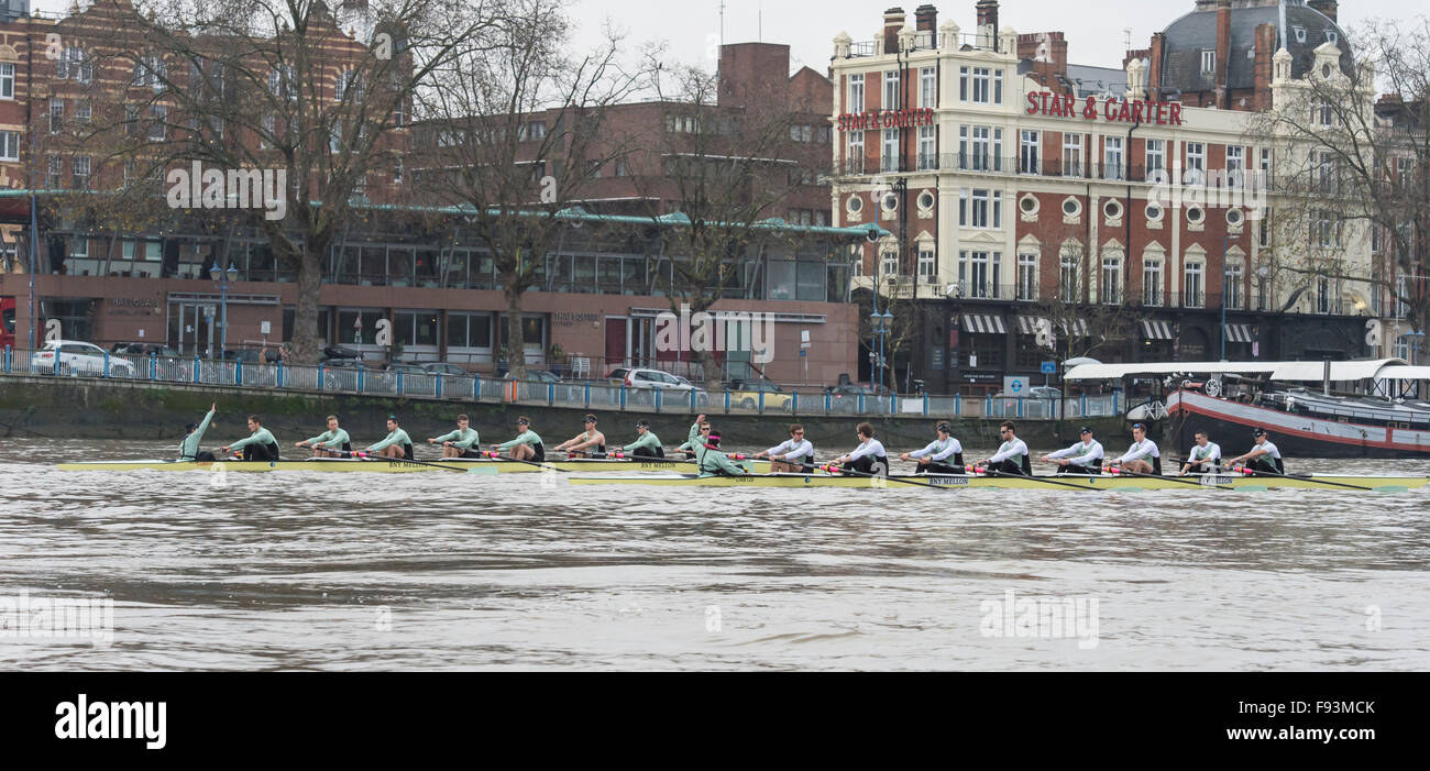 River Thames, UK. 13th December, 2015. Boat Race Trial VIIIs.  Cambridge  University Boat Club. Trial VIIIs serve as an important learning experience and selection test for the sixteen rowers and two coxes chosen. It is the only occasion during the season that the squad members race side-by-side for the entire four and a quarter miles of the Championship Course in a simulation of The BNY Mellon Boat Race. The two Cambridge crews taking to the water have been named ‘”Fuerte” and “Listo”. Credit:  Duncan Grove/Alamy Live News Stock Photo