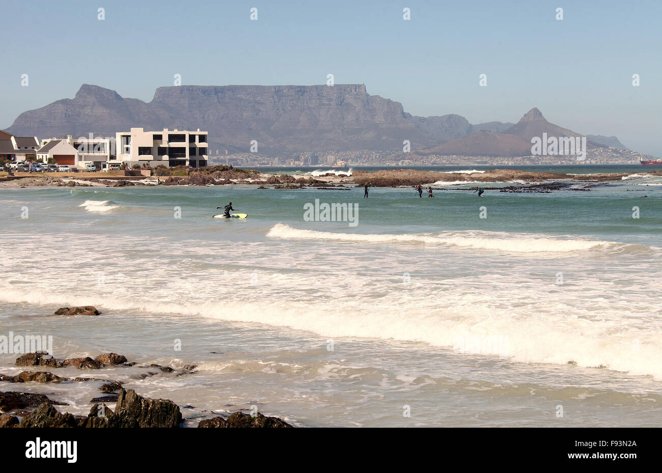 Stand Up Paddle Surfers at Bloubergstrand Beach in Cape Town Stock Photo Alamy