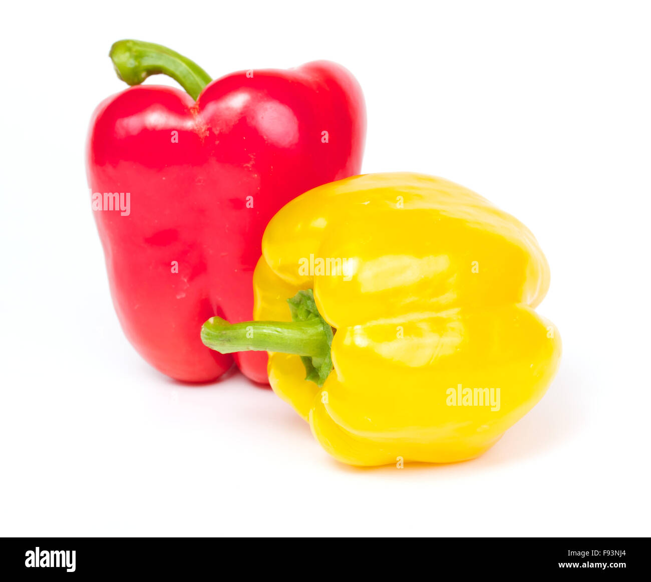 Red and yellow pepper are isolated on a white background Stock Photo ...