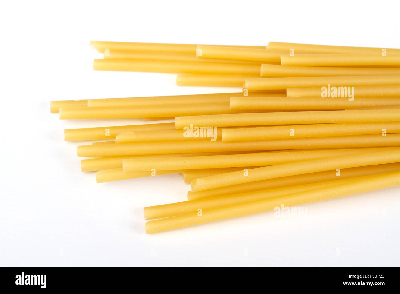 uncooked spaghetti noodles isolated on white background Stock Photo Alamy