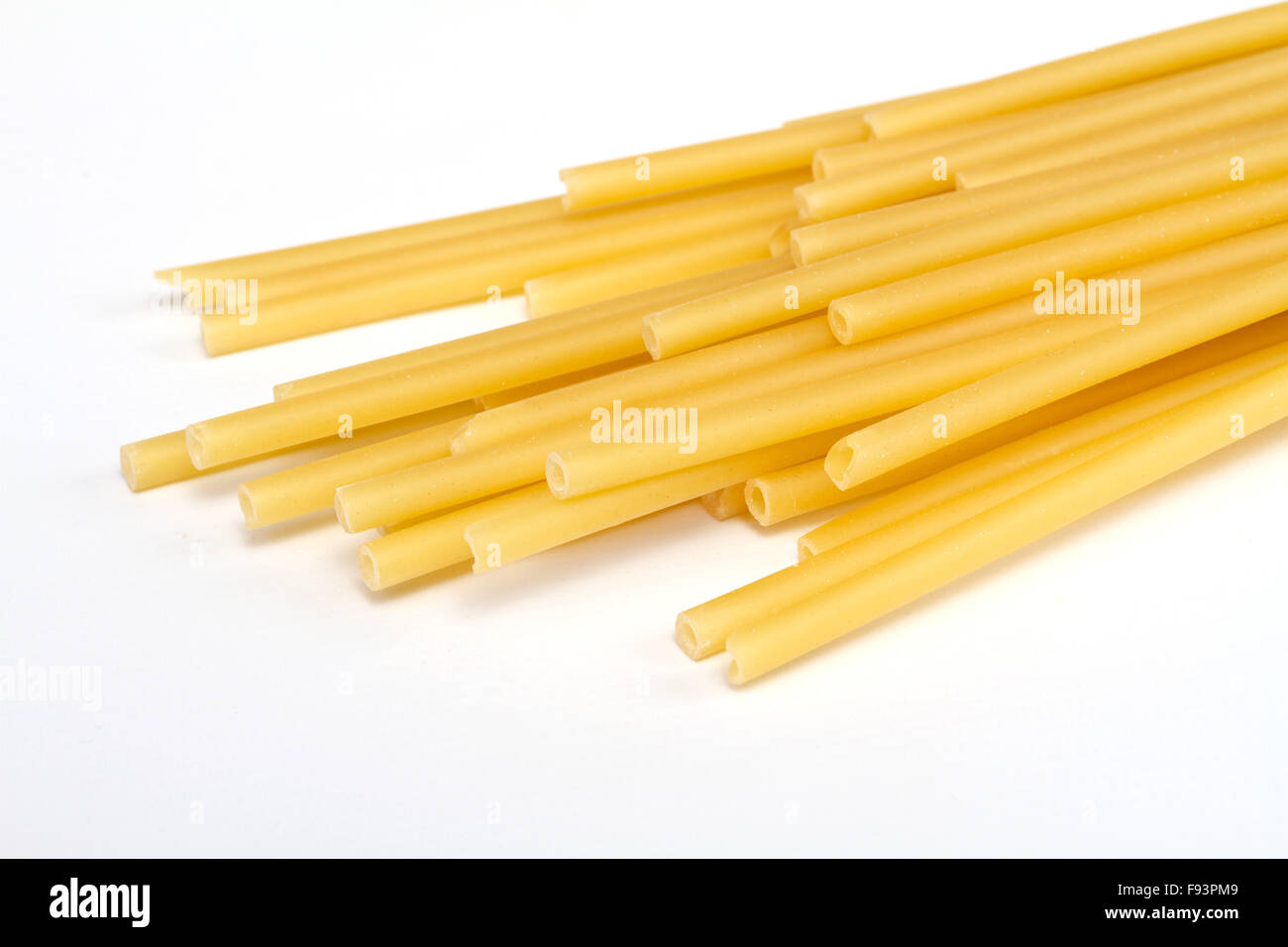 uncooked spaghetti noodles isolated on white background Stock Photo Alamy