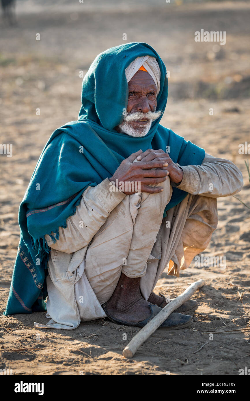 Portrait of a senior Rajasthani camel driver, Pushkar, Rajasthan, India Stock Photo