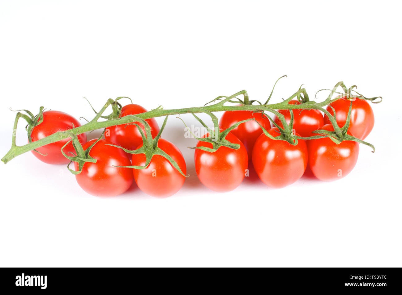 cherry tomatoes isolated on a white background Stock Photo - Alamy