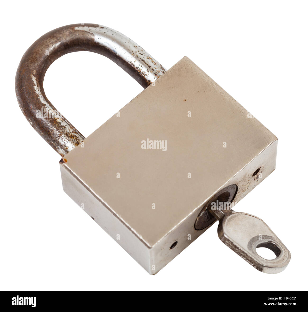 closed steel old padlock with key isolated on white background Stock ...