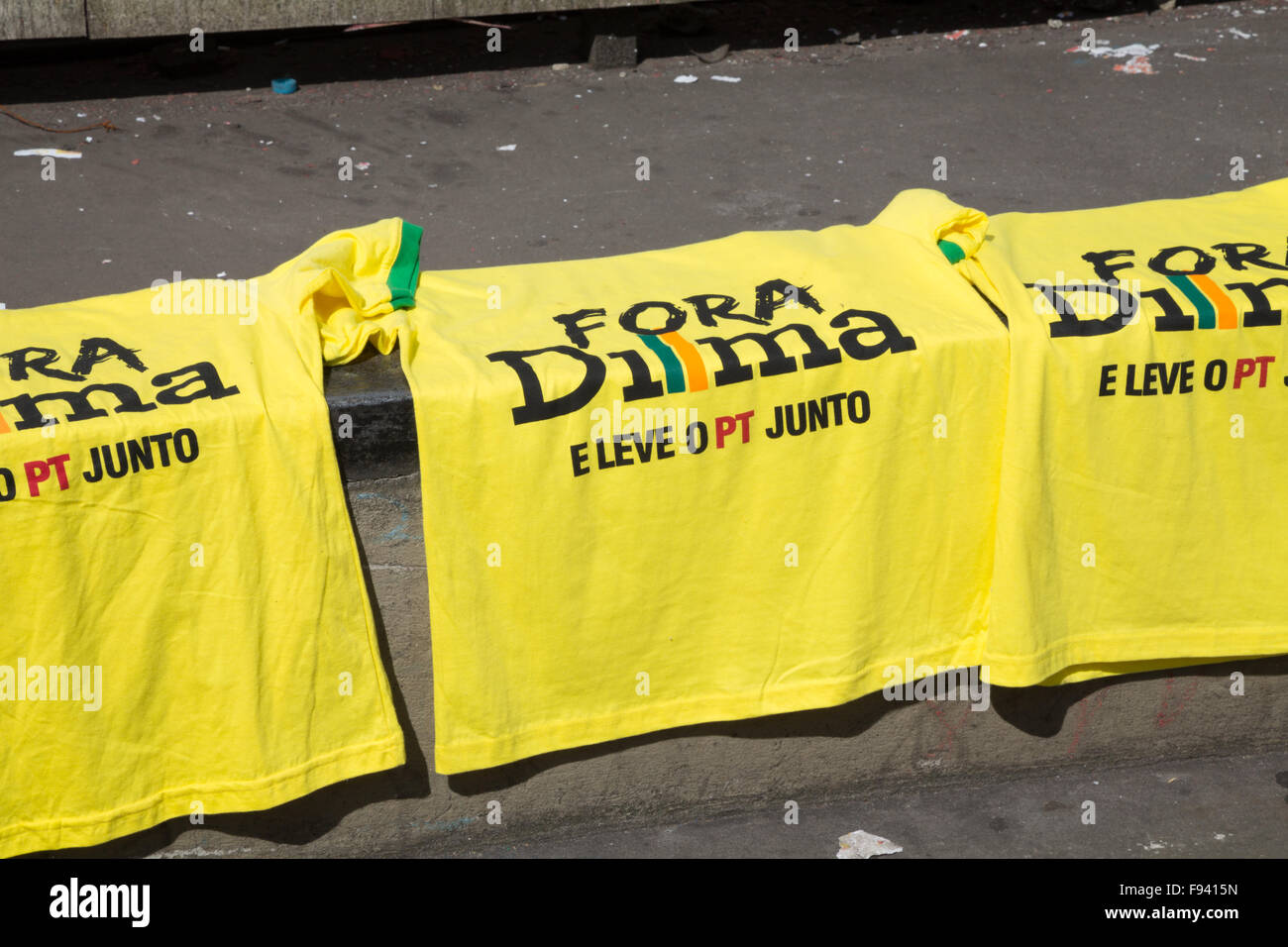 Sao Paulo, Brazil. 13th December, 2015. T-shirts written in Portuguese 'Fora Dilma e leve o PT junto' (in English 'Go Out Dilma and take the PT together') are seen during a demonstration calling for the impeachment of Brazil's President Dilma Rousseff in Paulista avenue, Sao Paulo, Brazil. Credit: Andre M. Chang/Alamy Live News Stock Photo