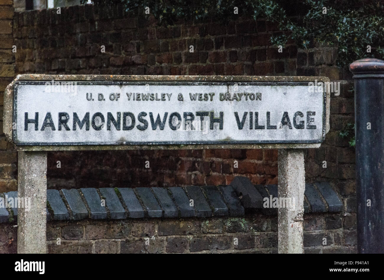A village street sign in Harmondsworth an ancient village threatened with destruction due to Heathrow Airport expansion Stock Photo