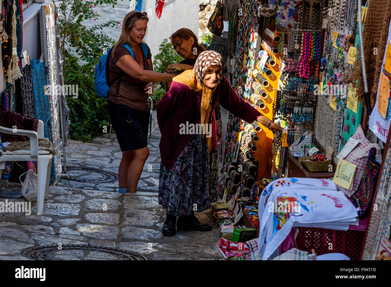 Tourists Buying Souvenirs From A Gift Shop In The Old Town Of Marmaris, Mugla Province, Turkey Stock Photo