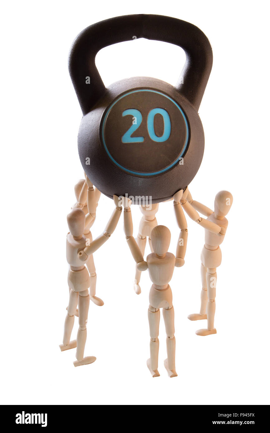 Group of puppets carrying heavy weight as a teamwork concept on white background Stock Photo