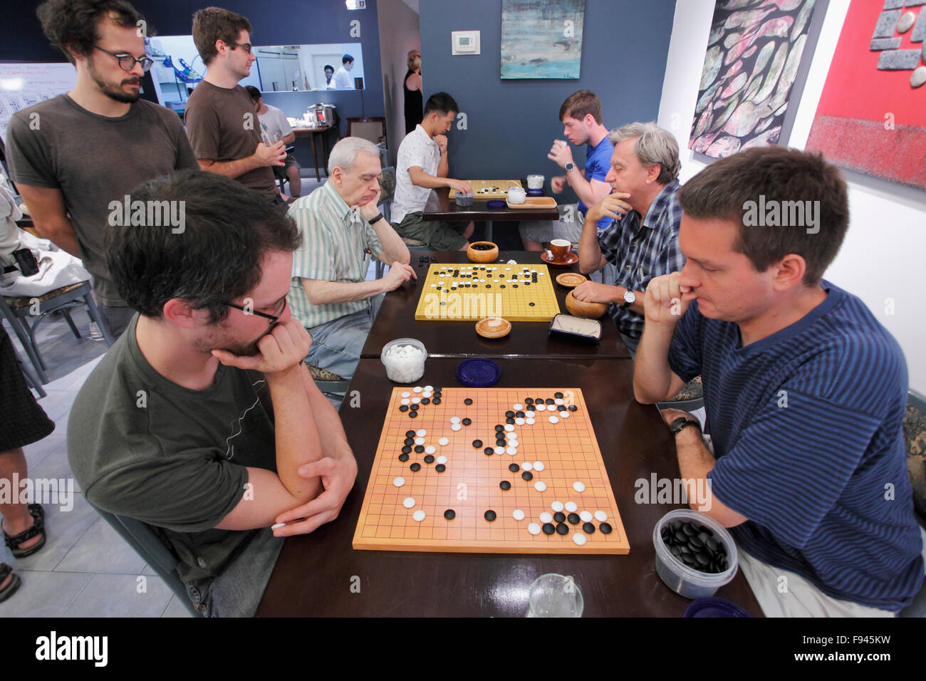 People playing go, strategic board game, Stock Photo