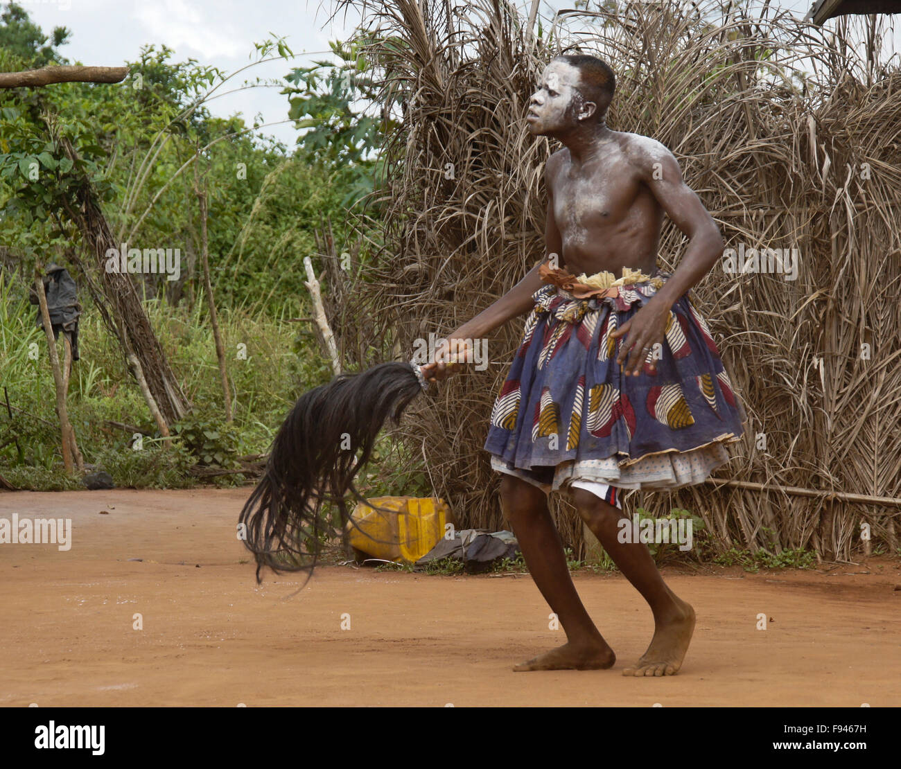 Vodun (voodoo) ceremony for Gambada divinity, where this man is possessed by a spirit, village near Abomey, Benin Stock Photo