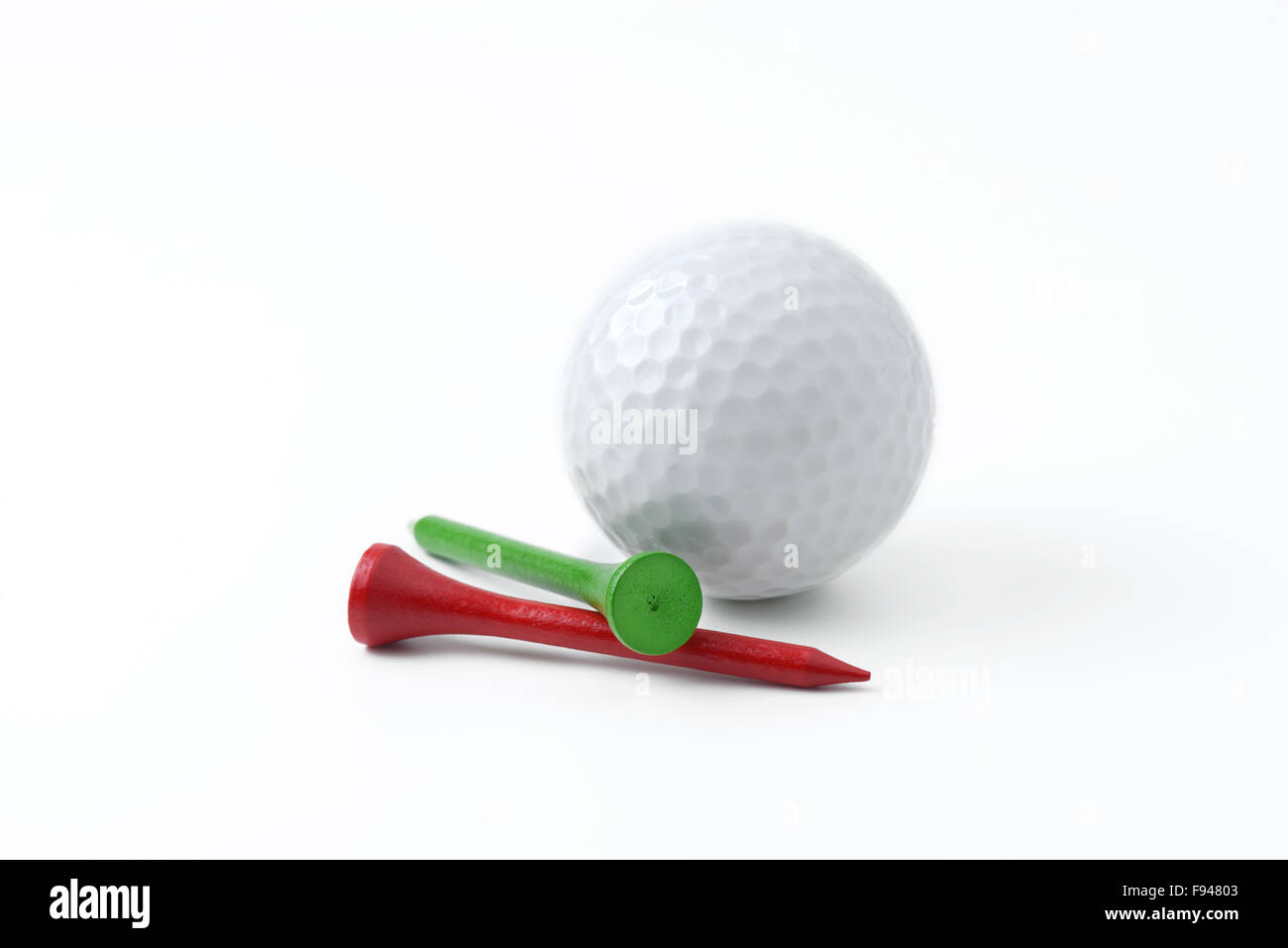 golf ball and tee on white background Stock Photo