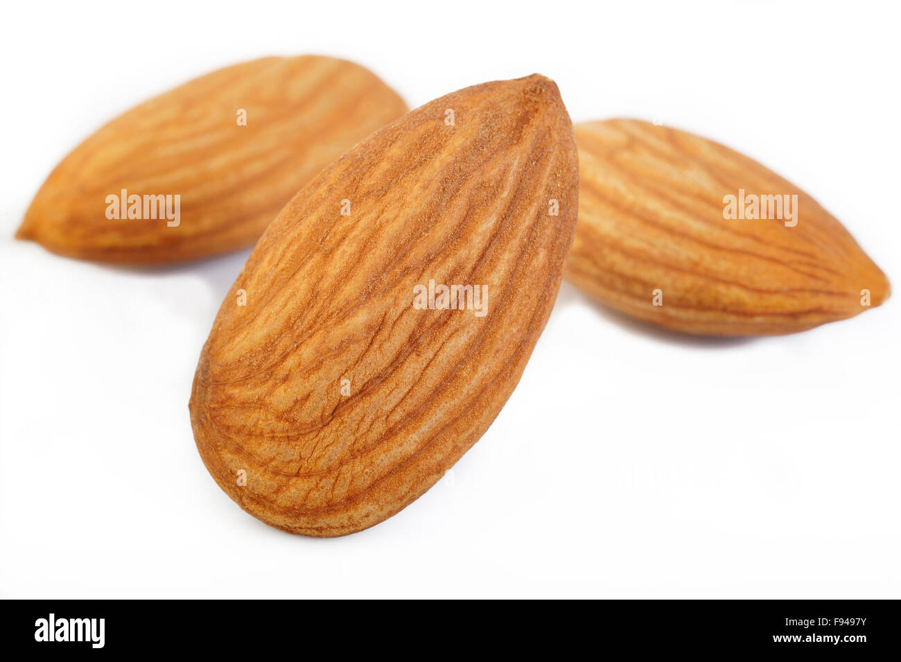 raw almond nuts isolated on white background Stock Photo
