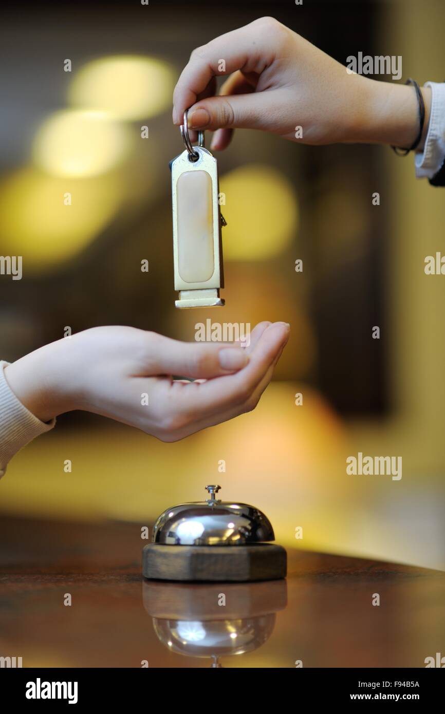 Reception Incheckning business woman at the reception of a hotel checking in Stock Photo - Alamy