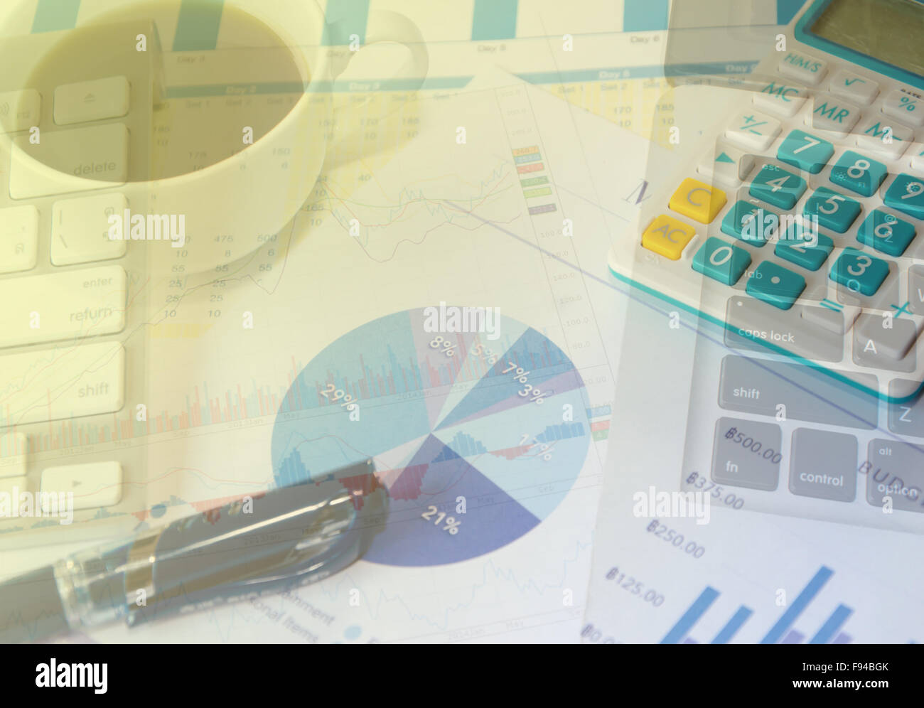 paper chart and computer on table.business concept Stock Photo - Alamy