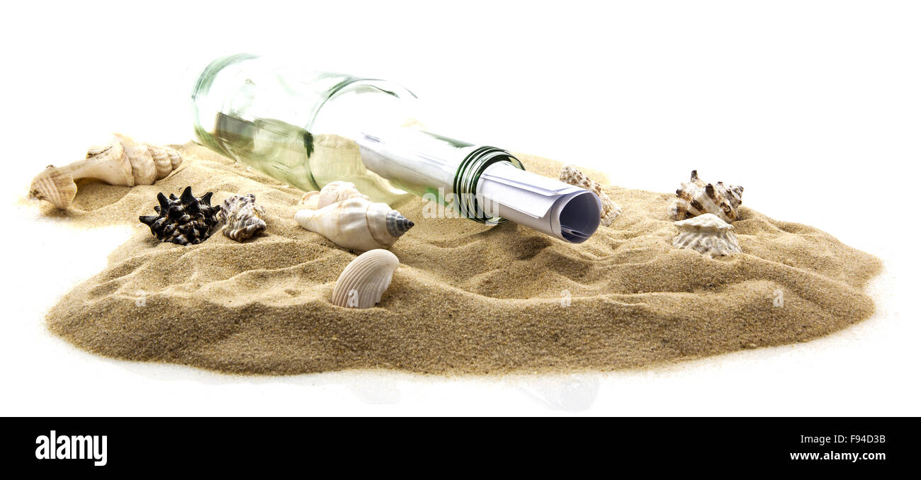 Bottle washed up on the beach, with a message inside Stock Photo