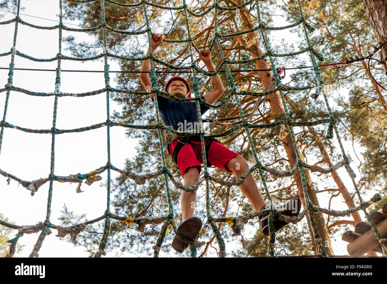 Boy wearing safety harness helmet hi-res stock photography and images ...