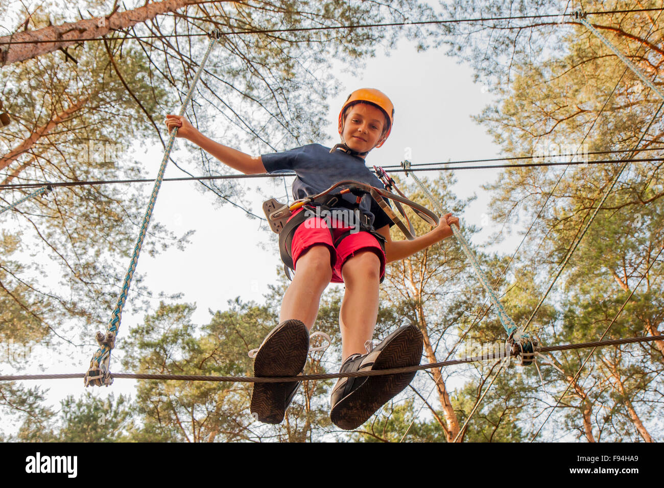 Boy wearing safety harness helmet hi-res stock photography and images ...