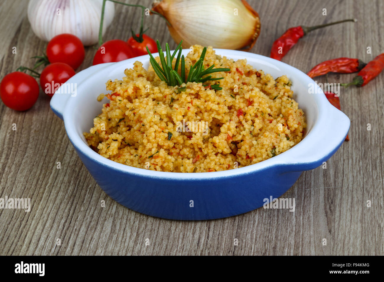 Arabic traditional cuisine Couscous with tomato and green onion Stock
