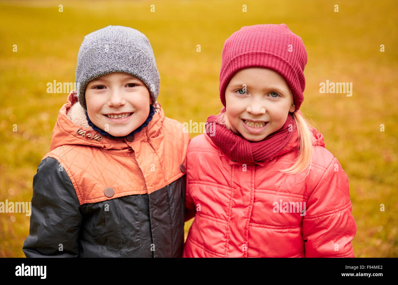 happy little girl and boy in autumn park Stock Photo