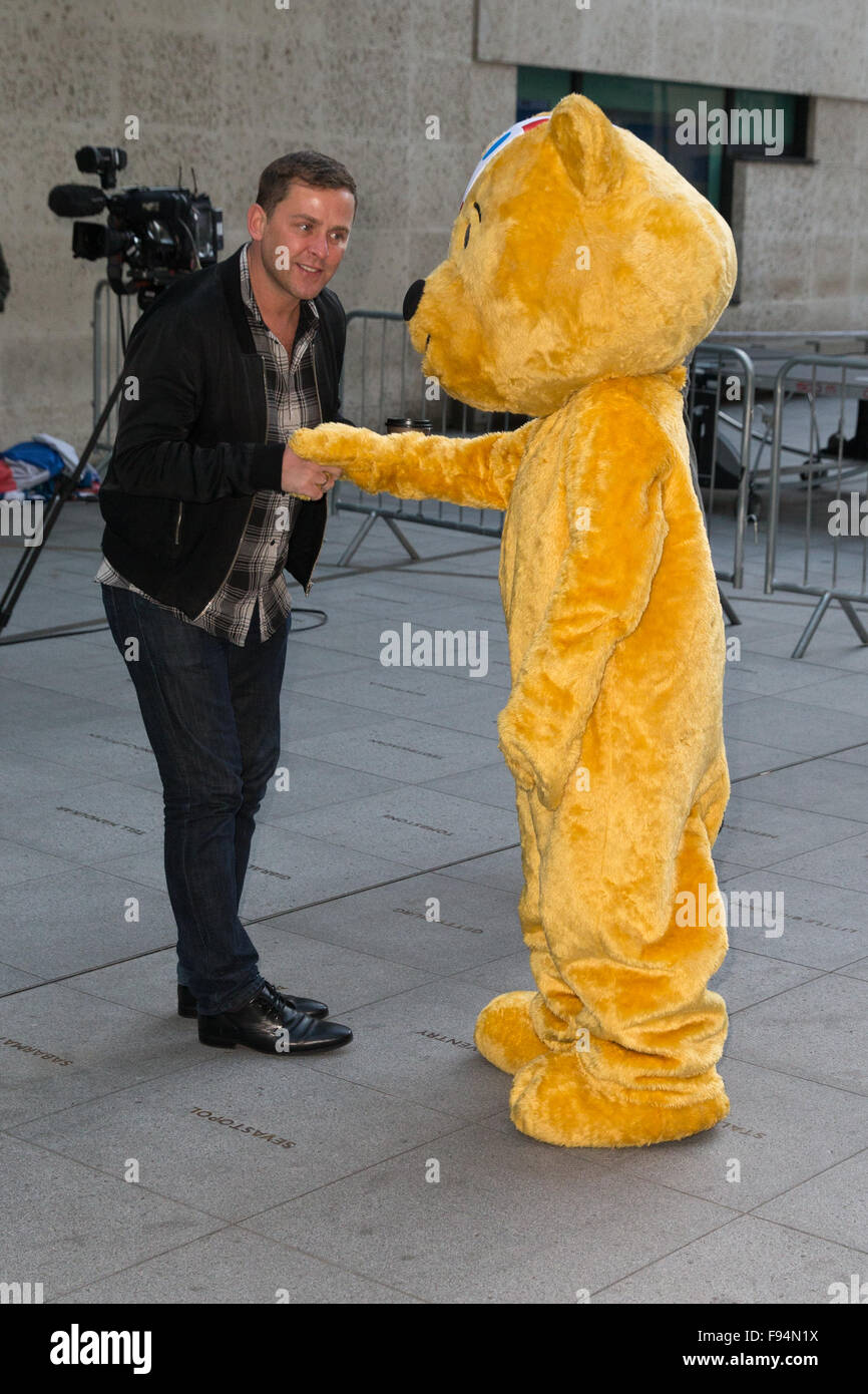 Celebrities at the BBC Studios - Scott Mills, Pudsey Scott Mills meets Pudsey on Children in Need day  Featuring: Scott Mills, Pudsey Where: London, United Kingdom When: 13 Nov 2015 Stock Photo