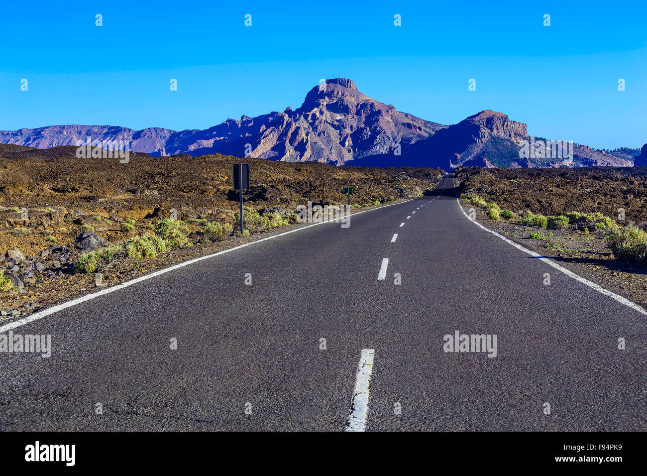 Landscape with Asphalt Road and Mountains on Canary Island Stock Photo