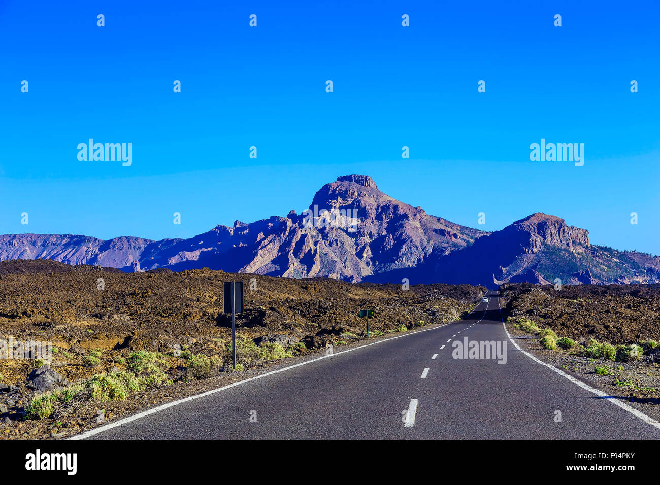 Landscape with Asphalt Road and Mountains on Tenerife Canary Island Stock Photo