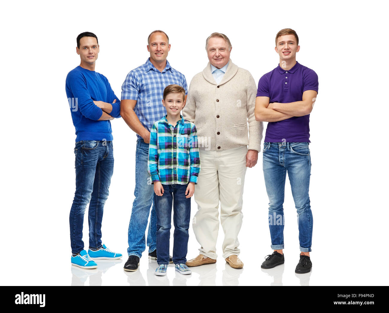 group of smiling men and boy Stock Photo