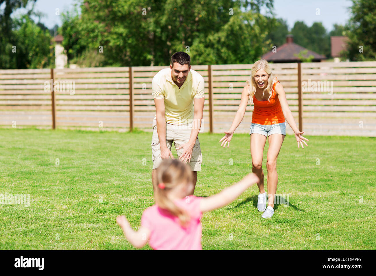 happy family playing outdoors Stock Photo - Alamy