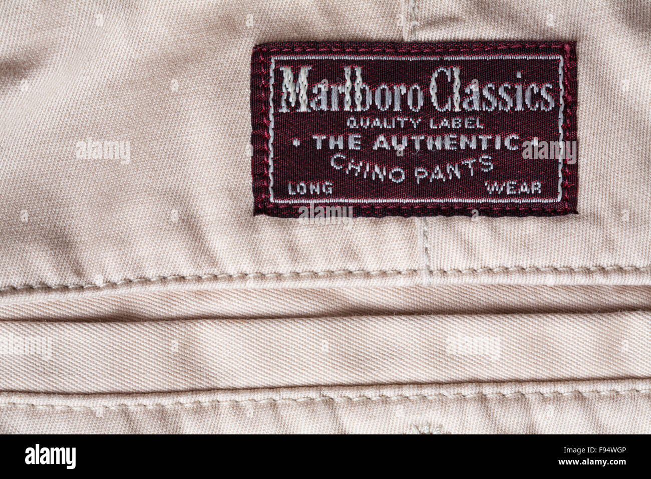 Marlboro Classics quality label The Authentic Chino Pants label on mans trousers Stock Photo