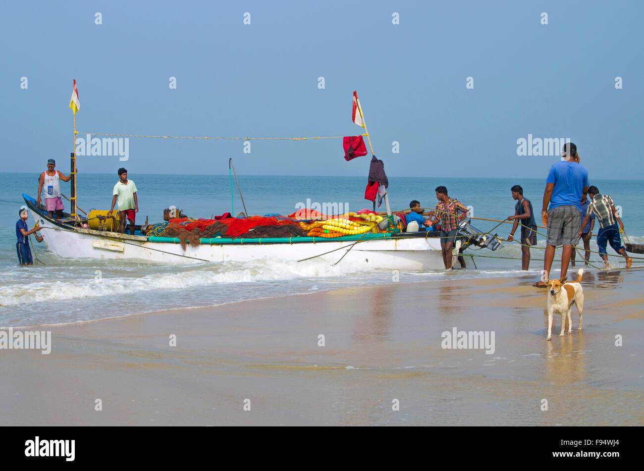 fishermen on the seashore equip the boat, fishermen, the sea, Hindus, India, the boat, preparation, fishing, the ocean Stock Photo