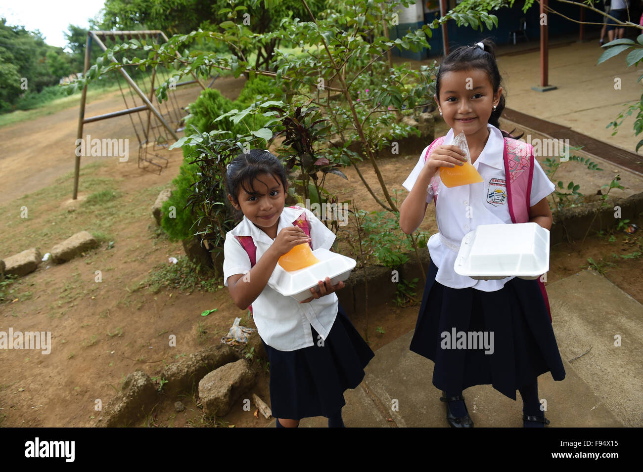 Nindiri, Nicaragua. 27th Nov, 2015. Children receive lunch at the San Francisco school in Nindiri, Nicaragua, 27 November 2015. The school is supported by World Vision. During the holidays, the food was served after a theater performance. Photo: Jens Kalaene/dpa/Alamy Live News Stock Photo