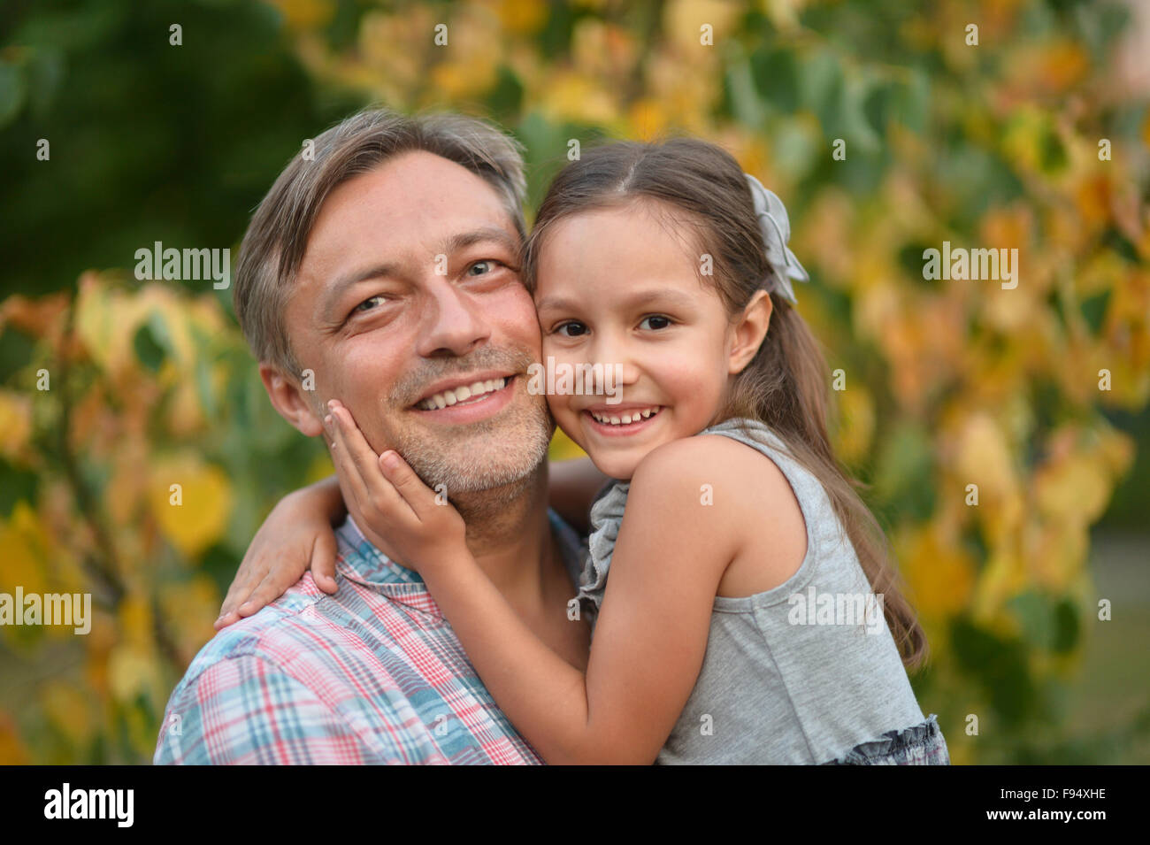 father with daughter in summer park Stock Photo - Alamy