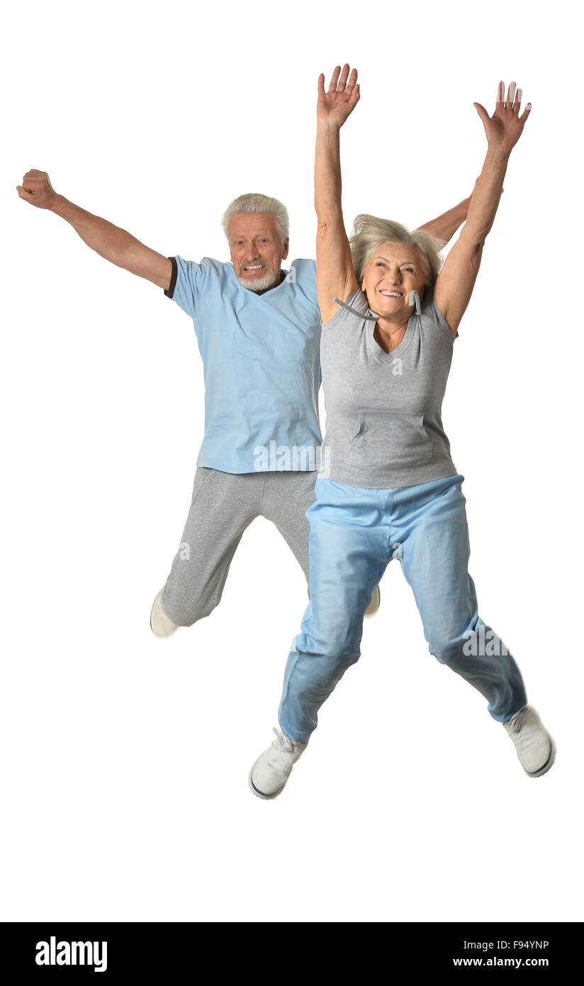 Senior couple jumping Stock Photo