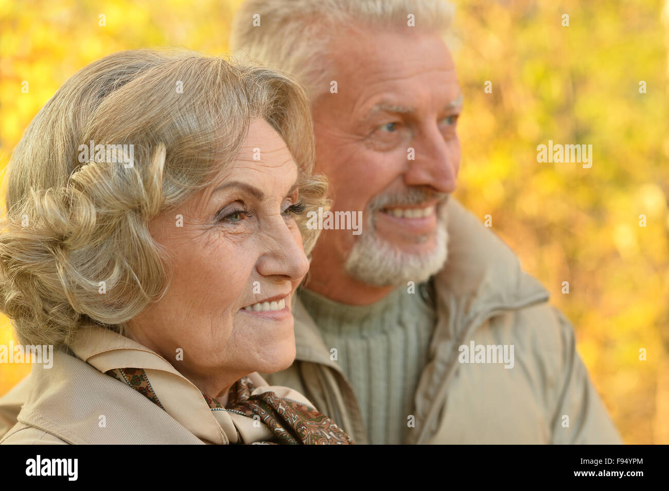 Senior couple in autumn park Stock Photo - Alamy