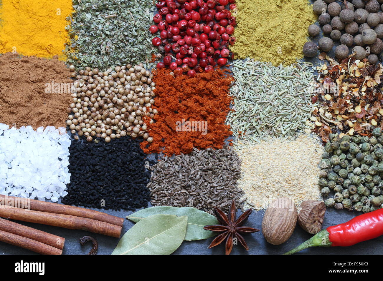 Spices and herbs on black marble abstract background concept Stock ...