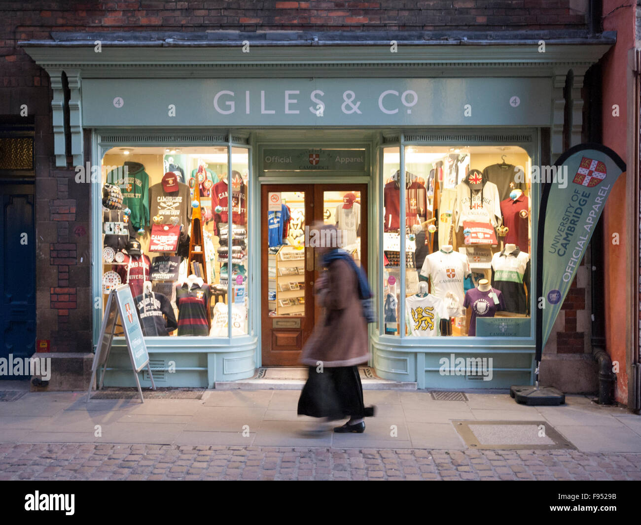 The shop window at Giles and Co University of Cambridge clothing store at dusk in Cambridge UK