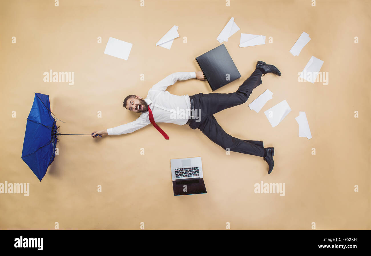 businessman slip and fall and a funny pose Stock Photo - Alamy