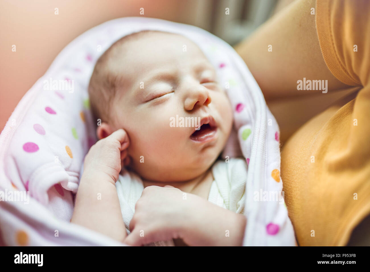 Cute sleeping baby on the bed indoors Stock Photo