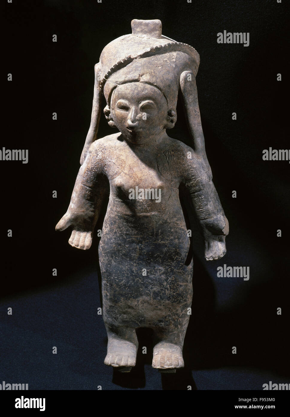 Pre-Columbian art. Pre-Incan. Tumaco-Tolita culture. Region of the Pacific Colombo-Ecuadorian coast from 300BC-600 AD. Ceramic object. Female figure. 44 x 22 cm. From Ecuador. Private collection. Stock Photo