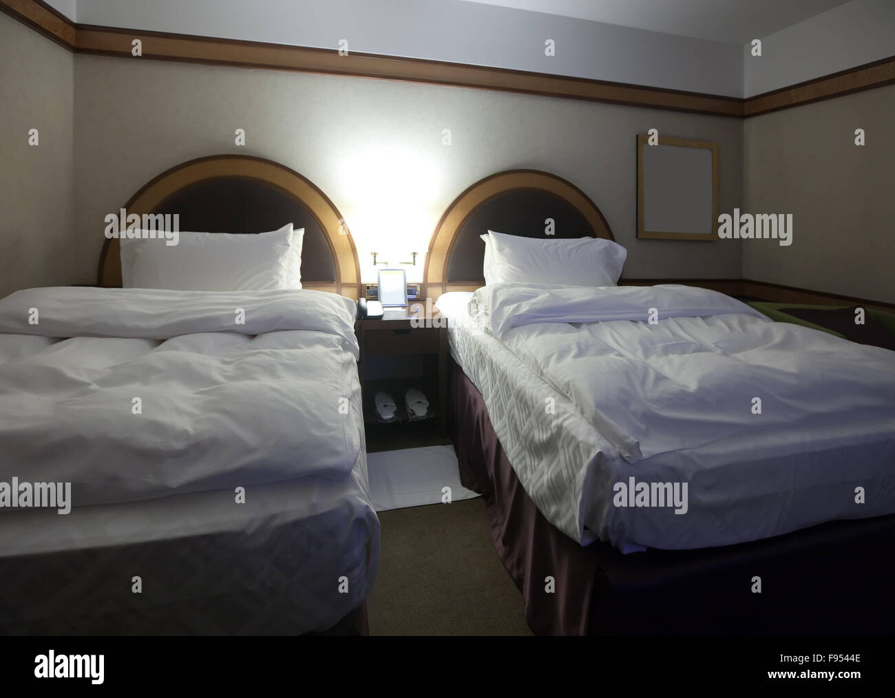 interior of bedroom with two bed Stock Photo - Alamy